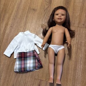 Doll with White Outfit and Plaid Skirt
